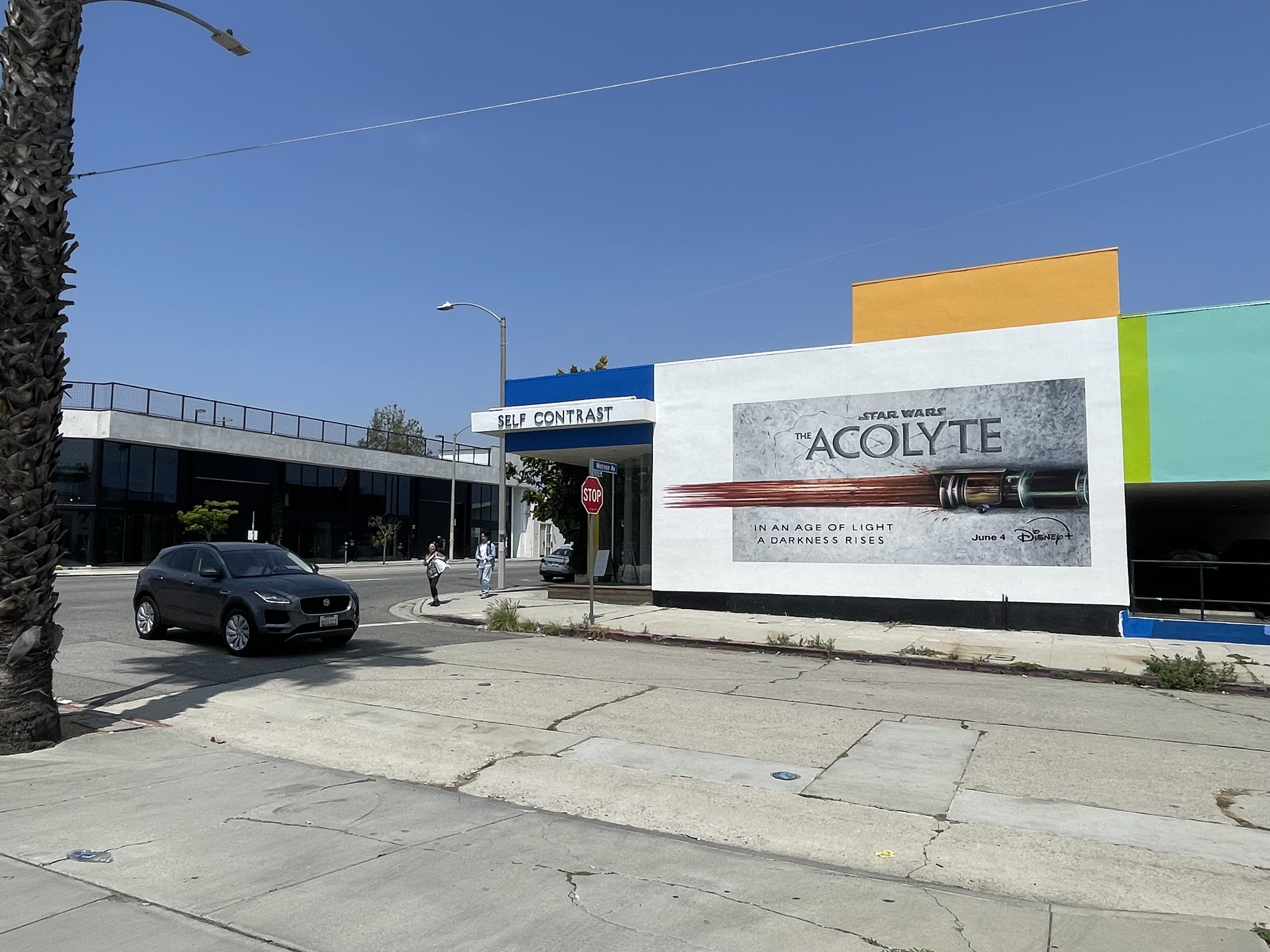 Star Wars The Acolyte Disney+ hand painted mural on white building exterior in Los Angeles street view