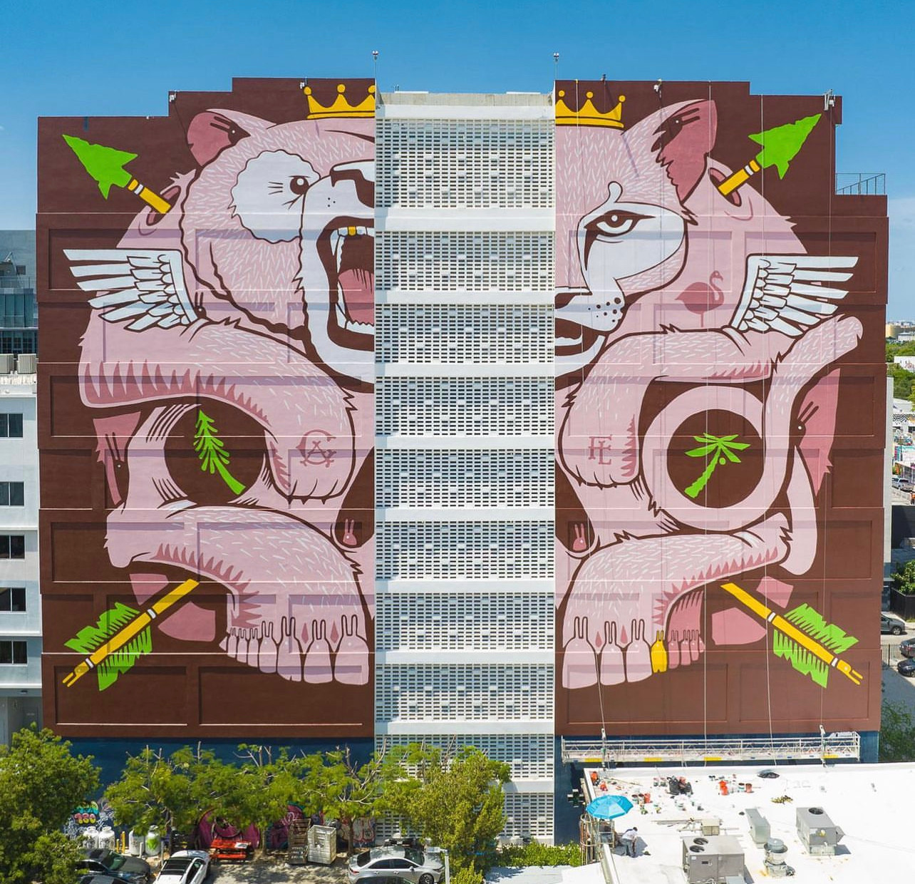 New Balance large-scale hand painted advertisement on parking garage exterior in Miami Florida